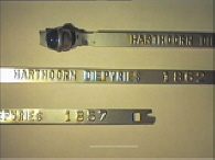 Goedgekeurde stalen bandverzegeling met alfanumeriek identificatiekenmerk HARTHOORN DIEPVRIES