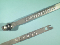 Goedgekeurde stalen bandverzegeling met alfanumeriek identificatiekenmerk NL008273510/00