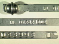 Goedgekeurde stalen bandverzegeling met alfanumeriek identificatiekenmerk NL  812421802