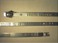 Goedgekeurde stalen bandverzegeling met numeriek identificatiekenmerk 401107