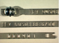 Goedgekeurde stalen bandverzegeling met alfanumeriek identificatiekenmerk IFV 005083886/00