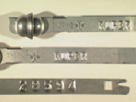 Goedgekeurde stalen bandverzegeling met alfanumeriek identificatiekenmerk KUPER