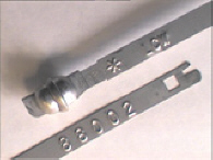 Goedgekeurde stalen bandverzegeling met alfanumeriek identificatiekenmerk LCW