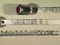 Goedgekeurde stalen bandverzegeling met alfanumeriek identificatiekenmerk MUSKETIER BV