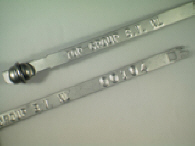 Goedgekeurde stalen bandverzegeling met alfanumeriek identificatiekenmerk TOP GROUP B.V. NL