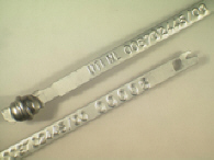 Goedgekeurde stalen bandverzegeling met alfanumeriek identificatiekenmerk UTI NL 008702445/00