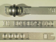 Goedgekeurde stalen bandverzegeling met alfanumeriek identificatiekenmerk XN 80938759100