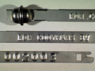 Goedgekeurde stalen bandverzegeling met alfanumeriek identificatiekenmerk KON.COOYMANS BV