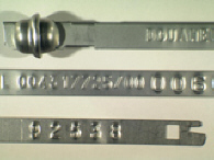 Goedgekeurde stalen bandverzegeling met numeriek identificatiekenmerk 004317725/00