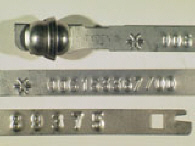 Goedgekeurde stalen bandverzegeling met numeriek identificatiekenmerk 006153367/00