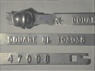 Goedgekeurde stalen bandverzegeling met numeriek identificatiekenmerk 103038