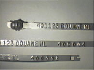 Goedgekeurde stalen bandverzegeling met numeriek identificatiekenmerk 40.1123