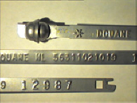 Goedgekeurde stalen bandverzegeling met numeriek identificatiekenmerk 56311021019