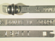 Goedgekeurde stalen bandverzegeling met numeriek identificatiekenmerk 705297