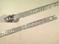 Goedgekeurde stalen bandverzegeling met numeriek identificatiekenmerk 804355174/00